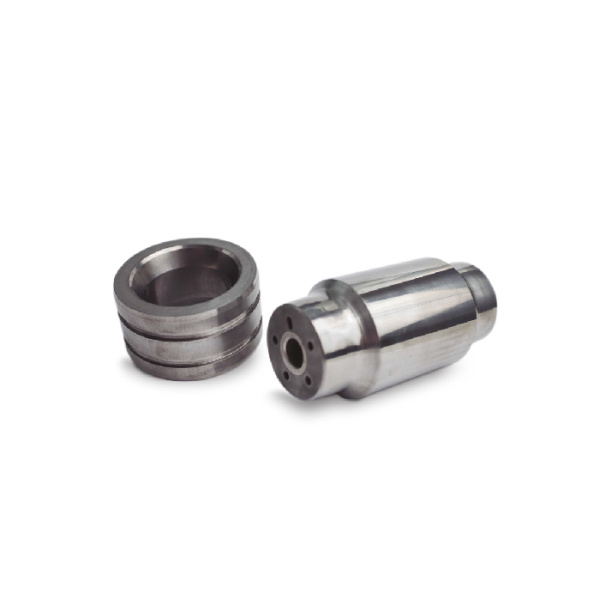 Tungsten carbide flow control plug and seat
